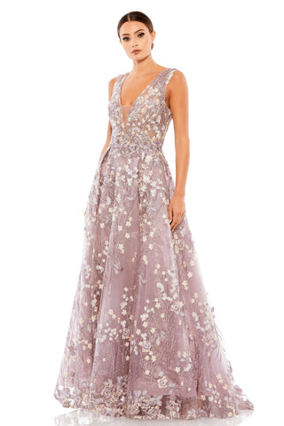 Full-length three-quarter view of the lilac embroidered gown with plunging illusion V-neck by Mac Duggal at Mrs. G