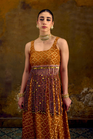 Yellow Banarasi Bandhani Lehenga Set with Cascading Tassels by Muskkaan Kapadia