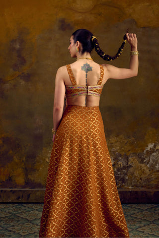 Yellow Banarasi Bandhani Lehenga Set with Cascading Tassels by Muskkaan Kapadia