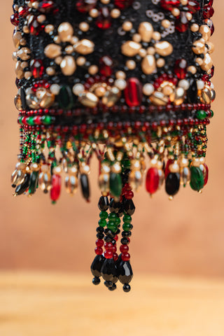 Maroon empress boshkeh cylinder bag, close-up detail, by Nayaab by Sonia at Mrs. G