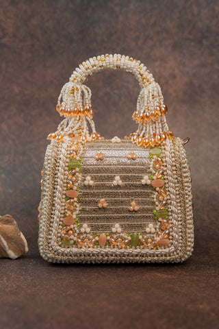 Gold empress charm flap bag, front view, by Nayaab by Sonia at Mrs. G