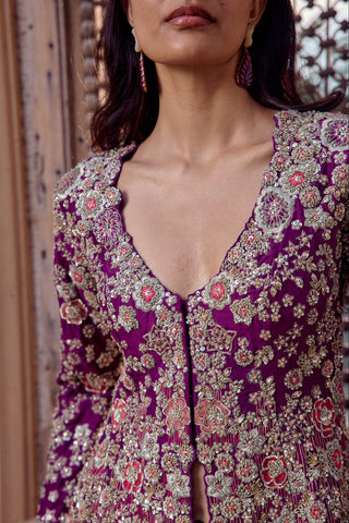 Close-up of the jacket V-neckline in gold zardozi, silver sequins and coral pink flowers by Osaa by Adarsh at Mrs. G