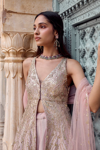Waist-up close-up of sequin and zardosi embroidery on the camellia pink V-neck jacket by Osaa by Adarsh at Mrs. G
