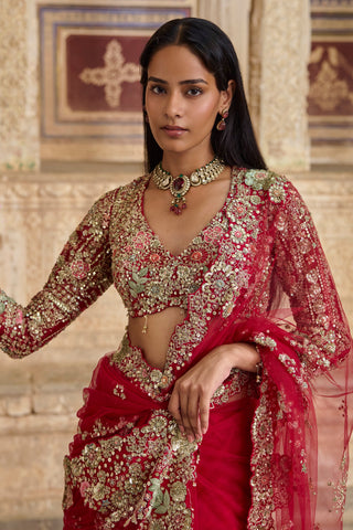 Waist-up view of the deep berry V-neck blouse and tulle pallu with sequin and floral embroidery by Osaa by Adarsh at Mrs. G