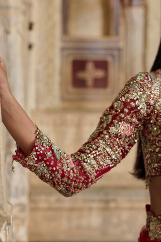 Close-up of the deep berry blouse sleeve cuff with sequins, sage leaf embroidery and tassel drops by Osaa by Adarsh at Mrs. G