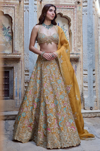 Front view of honey orange halter zardozi lehenga set with organza dupatta by Osaa by Adarsh at Mrs. G