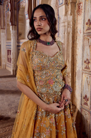 Waist-up close-up of honey orange sweetheart top with scalloped edge and raised pink flowers by Osaa by Adarsh at Mrs. G