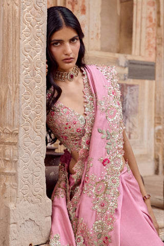 Waist-up view of the lavender blush sleeveless blouse with scalloped neckline and floral embroidered pallu by Osaa by Adarsh at Mrs. G
