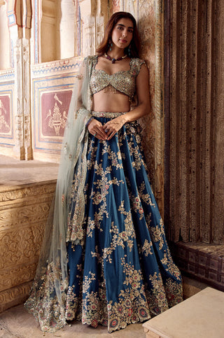 Front view of midnight blue floral zardozi lehenga set with sweetheart blouse and tulle dupatta by Osaa by Adarsh at Mrs. G