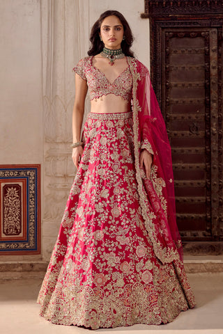 Front view of ruby pink bridal lehenga set with scalloped zardozi dupatta and V-neck blouse by Osaa by Adarsh at Mrs. G