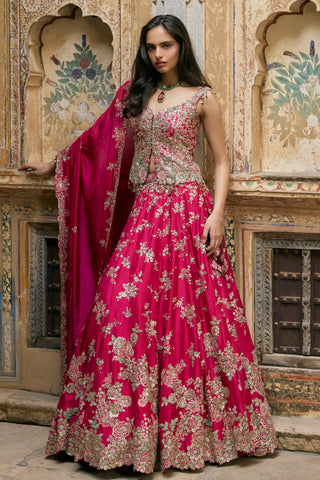 Front view of ruby pink rose appliqué lehenga set with peplum top and draped dupatta by Osaa by Adarsh at Mrs. G