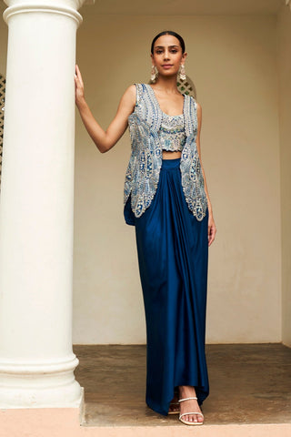 Full-length front view of jade blue long embroidered open jacket over bustier and draped skirt by Osaa by Adarsh at Mrs. G