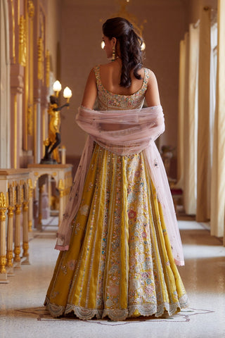 Back view of honey gold lehenga with embroidered blouse and blush pink net dupatta by Osaa by Adarsh at Mrs. G