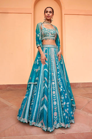 Front view of pine green lehenga with leaf creeper embroidered panels and net dupatta by Osaa by Adarsh at Mrs. G