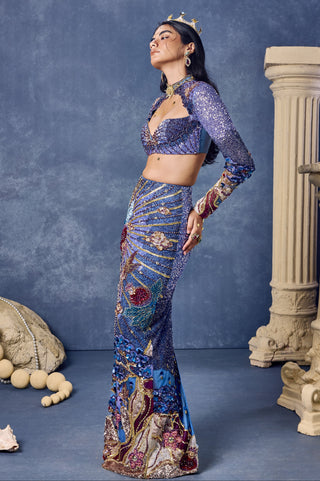 Side view of the blue sequin fitted skirt with a fan-shaped motif at Mrs. G