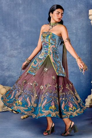 Three-quarter view of the half lehenga twirling with its paisley border at Mrs. G