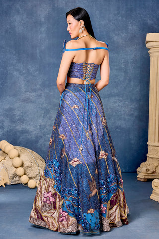 Back view of the blue corset with a lace-up back and the floral hem at Mrs. G