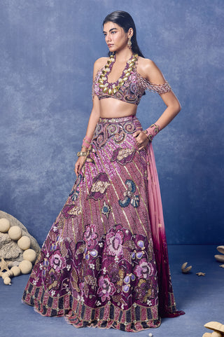 Three-quarter view of the pink crystal floral lehenga and halter blouse at Mrs. G