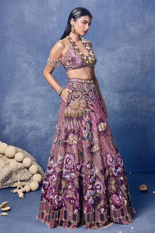 Side view of the pink and wine lehenga with embroidered florals at Mrs. G