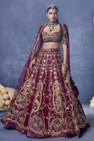 Front view of the maroon rouge devotion lehenga set with a matching dupatta at Mrs. G