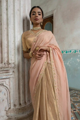 Closer front view of the gold zari tissue embroidered blouse and rose peach saree by Sheela Suthar at Mrs. G