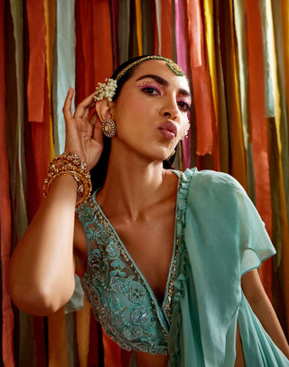 Mint green ruffle saree and blouse