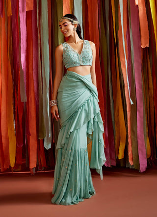 Mint green ruffle saree and blouse