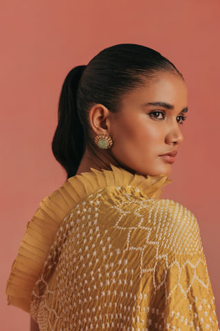 Close-up of the ruffle shoulder and bandhani pattern, yellow ziya one-shoulder kurta set by Twenty Nine at Mrs. G