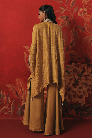 Back view of the kaftan falling over the bootcut pants, yellow ziya tassel kaftan set by Twenty Nine at Mrs. G