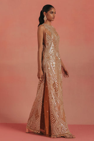 Full-length side view of the slit dress with bellbottom pants, peach ziya sleeveless kurta set by Twenty Nine at Mrs. G