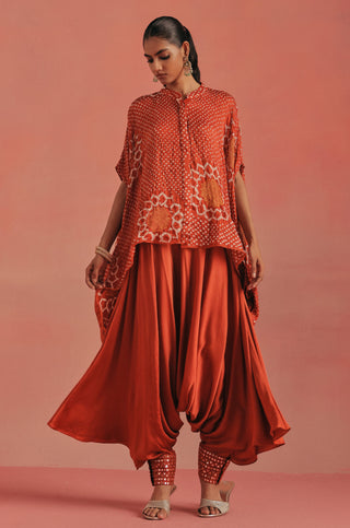 Front walking view of the dhoti flaring below the tunic, burnt orange ziya band collar dhoti set by Twenty Nine at Mrs. G