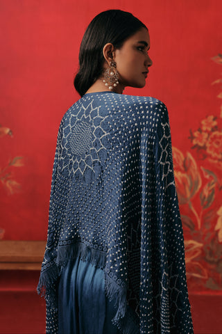 Back view of the cape with large star bandhani motifs, blue ziya tassel cape with dhoti by Twenty Nine at Mrs. G