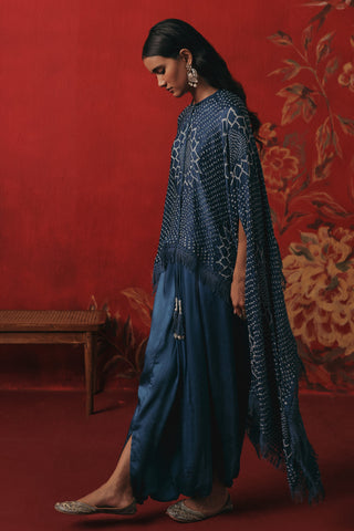 Side view of the cape with the tassel fringe in motion, blue ziya tassel cape with dhoti by Twenty Nine at Mrs. G