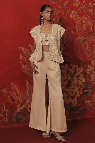 Full-length front view with one hand in the pocket, ivory ziya jacket set by Twenty Nine at Mrs. G