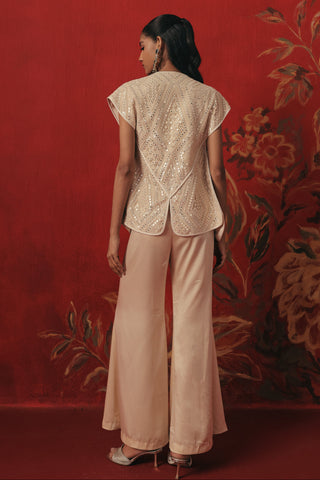 Back view of the gilet over the bellbottom pants, ivory ziya jacket set by Twenty Nine at Mrs. G