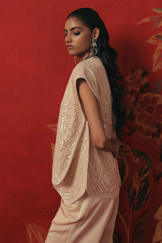Side view of the draped gilet and bellbottom pants, ivory ziya jacket set by Twenty Nine at Mrs. G