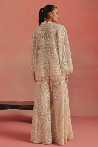 Back view of the cape jacket and sharara with diamond embroidery, ivory ziya mirrorwork sharara set by Twenty Nine at Mrs. G