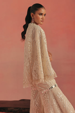 Side view of the jacket sleeve and the mirror band on the sharara, ivory ziya mirrorwork sharara set by Twenty Nine at Mrs. G