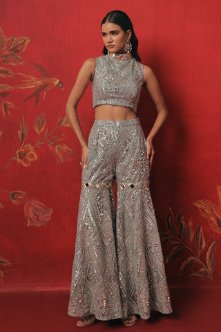 Front view of the crop top and sharara with hands on the hips, blue ziya crop jacket set by Twenty Nine at Mrs. G