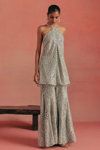 Full-length front view of the halter tunic and flared sharara, blue ziya cross strap sharara set by Twenty Nine at Mrs. G