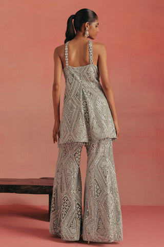 Back view of the halter tunic and flared mirror work pants, blue ziya cross strap sharara set by Twenty Nine at Mrs. G