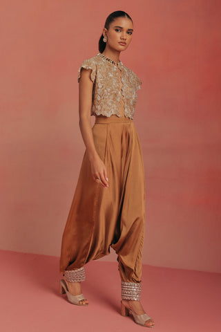 Full-length walking view of the jacket and tapered dhoti, natural gold ziya afghani dhoti set by Twenty Nine at Mrs. G