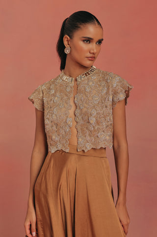 Waist-up front view of the closed lace jacket with a scalloped hem, natural gold ziya afghani dhoti set by Twenty Nine at Mrs. G