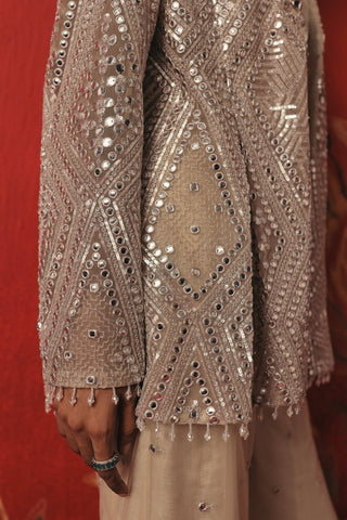Close-up of the mirror work and beaded edge on the blazer sleeve, silver ziya blazer sharara set by Twenty Nine at Mrs. G