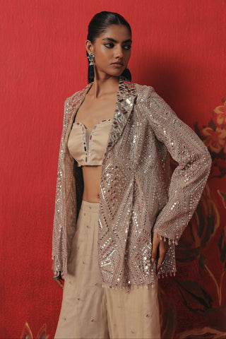 Waist-up view of the blazer open over the satin bandeau, silver ziya blazer sharara set by Twenty Nine at Mrs. G
