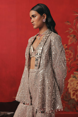 Side profile of the shawl collar and peplum with a necklace, pearl silver ziya jacket sharara set by Twenty Nine at Mrs. G