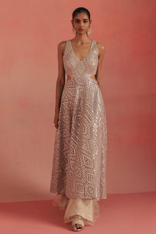 Full-length front view of the flared dress and cream sharara, silver ziya mirrorwork kurta set by Twenty Nine at Mrs. G