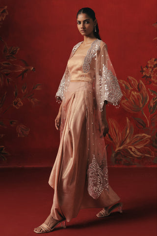 Side view of the jacket and draped pick-up skirt, pink ziya jacket set by Twenty Nine at Mrs. G