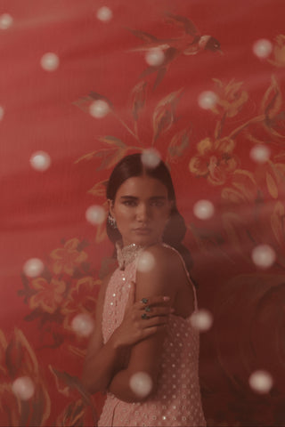 Soft-focus portrait of the tunic with sequin work through a sheer layer, pink lemonade ziya mirrorwork sharara set by Twenty Nine at Mrs. G