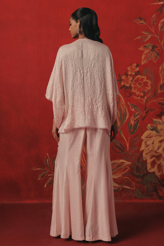 Back view of the top and flared pants, pink ziya overlap co-ord set by Twenty Nine at Mrs. G
